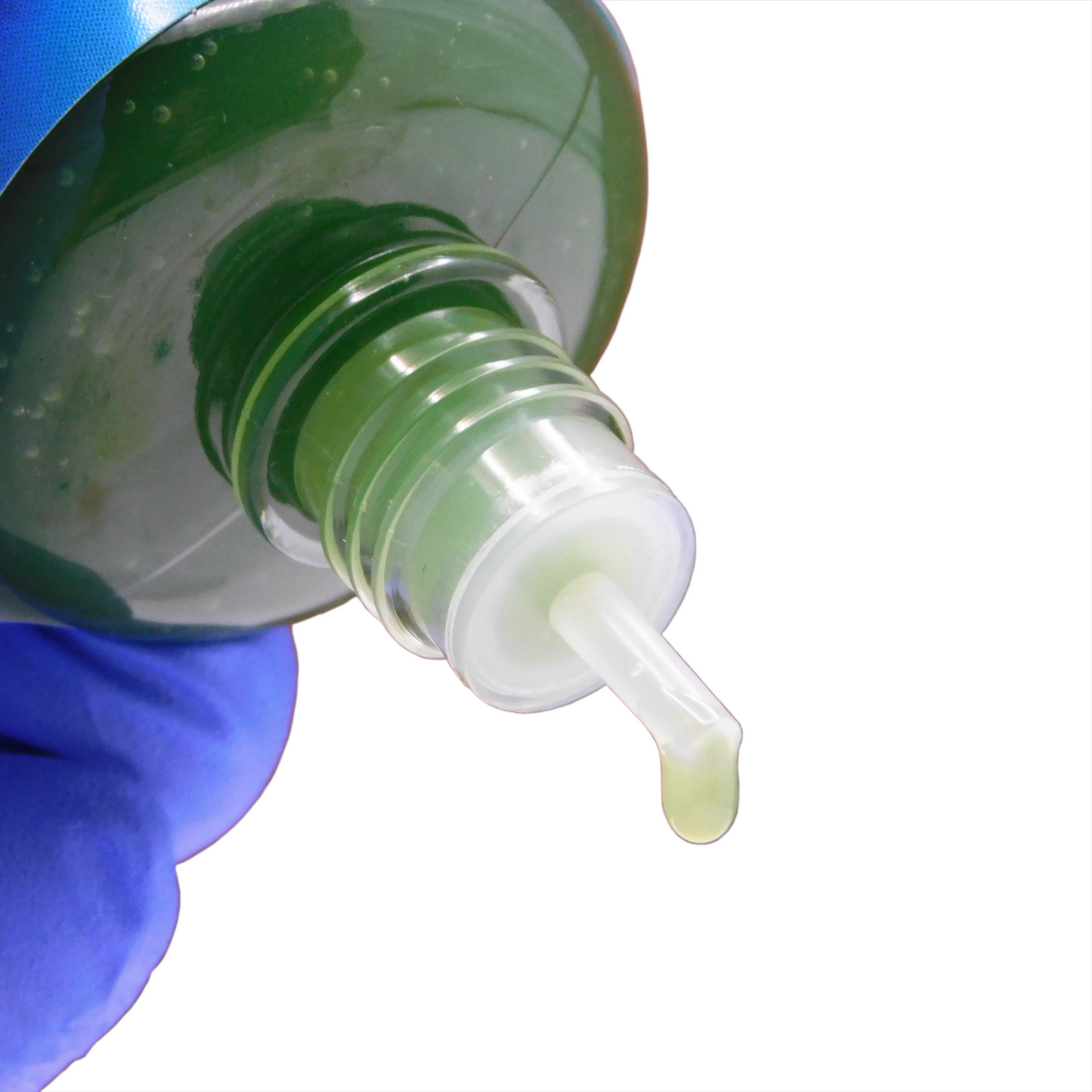 A 50ml plastic bottle of Revolubes Wet Blend bicycle chain lube with a precision applicator, designed for use in wet weather conditions.